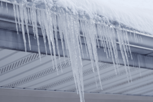 Read more about the article Do Ice Dams and Winter Weather Damage Your Roof?